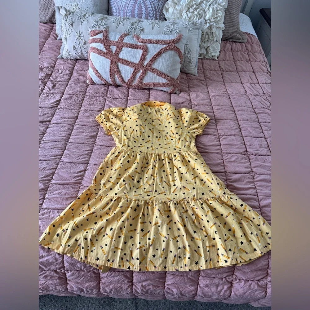 Girls size large (10/12)  school dress with pencils